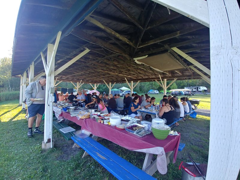 Potluck supper at the pavilion